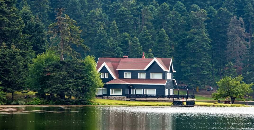 Rental home on a lake inside a forest