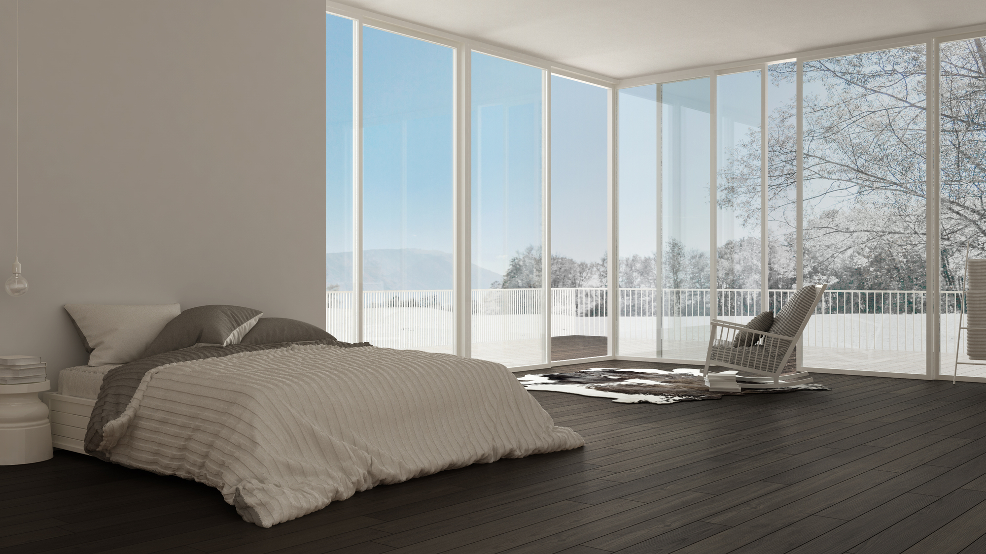 large bedroom with big windows during winter