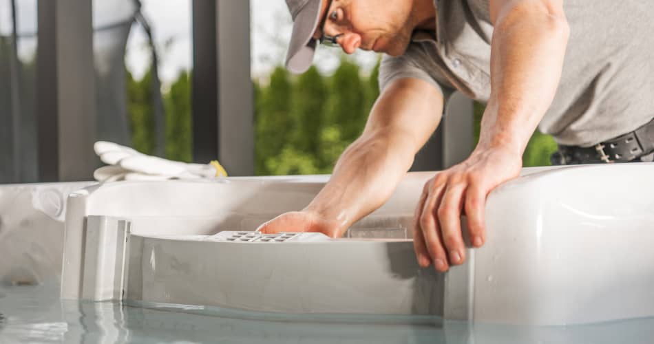 img - caucasian-spa-technician-performing-modern-hot-tub-repair-garden-spa