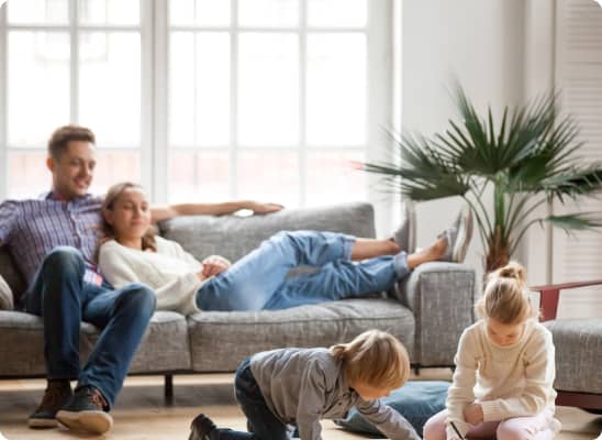 img - children-siblings-playing-drawing-together-while-parents-relaxin