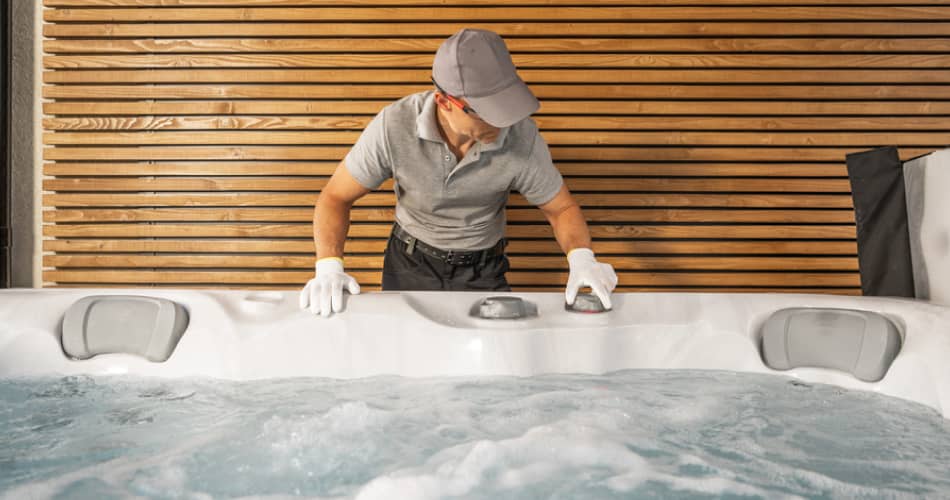 img - man-carefully-cleaning-hot-tub-contemporary-spa-setting-wears-gloves