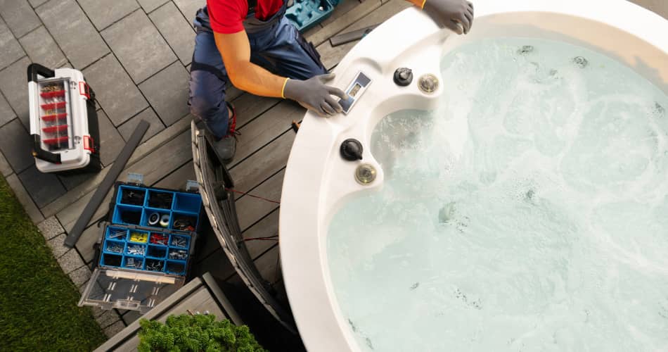 img - professional-caucasian-hot-tub-technician-servicing-circular-spa-residential-backyard