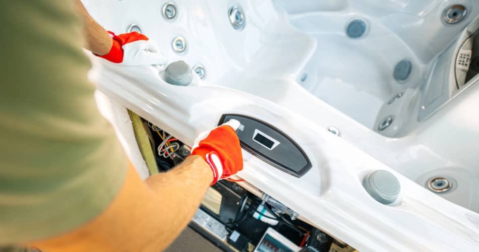 img - technician-gloves-adjusting-control-panel-hot-tub-ensuring-proper-functionality